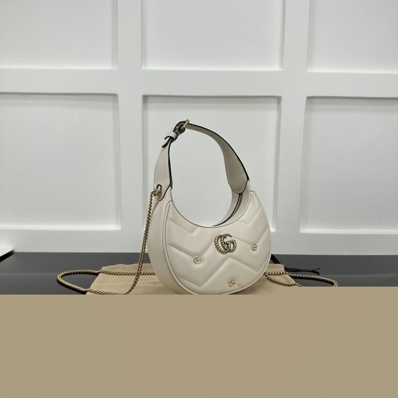 G*u*i top handle bags